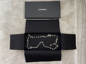 Boxed Chanel Pearl and Blue Crystal Long Necklace.