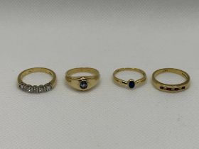 Four 14ct and 18ct Yellow Gold Rings.