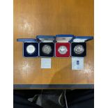 Collection of Four Collectible Commemorative Silve