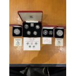 Collection of Eight Collectible Commemorative Silv