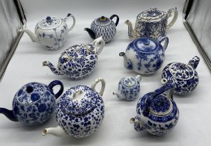 Collection of Antique Blue and White Teapots to in