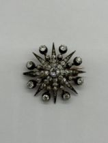 Antique Old Cut Diamond Starburst Brooch.