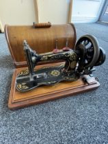 Cased Singer Sewing Machine.