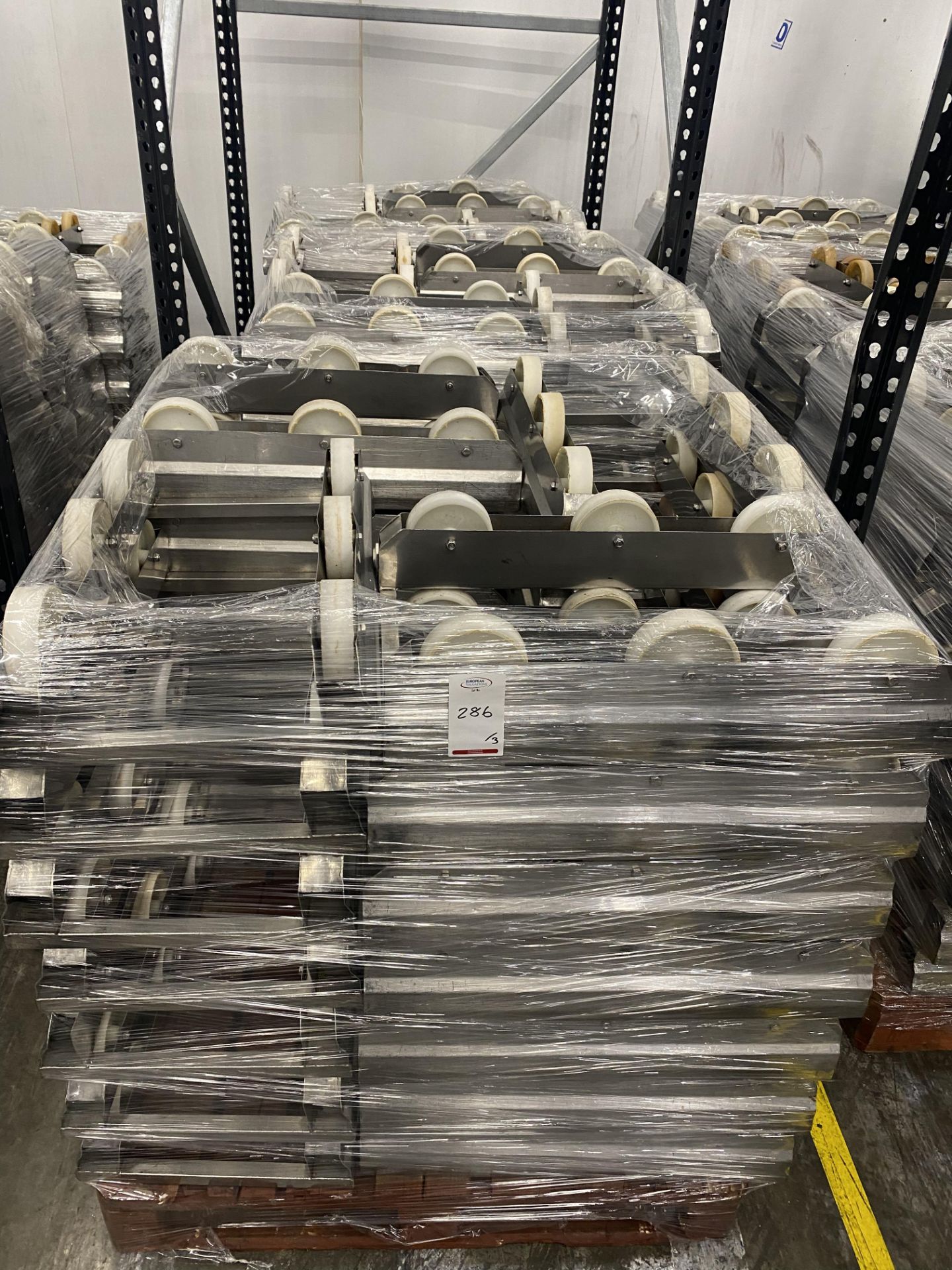 3 Pallet of stainless steel tray skids