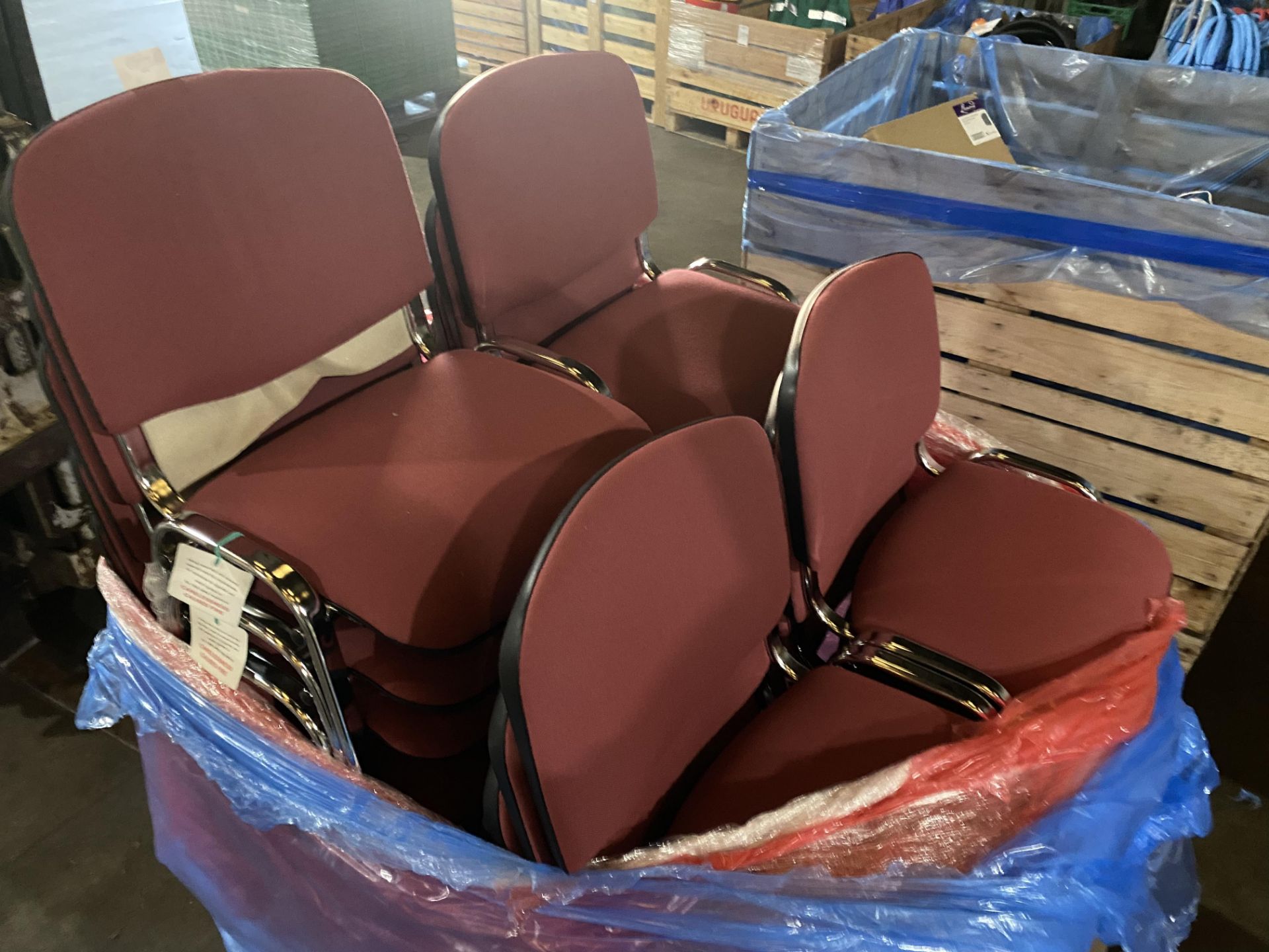 20 chrome framed red upholstered stacking chairs