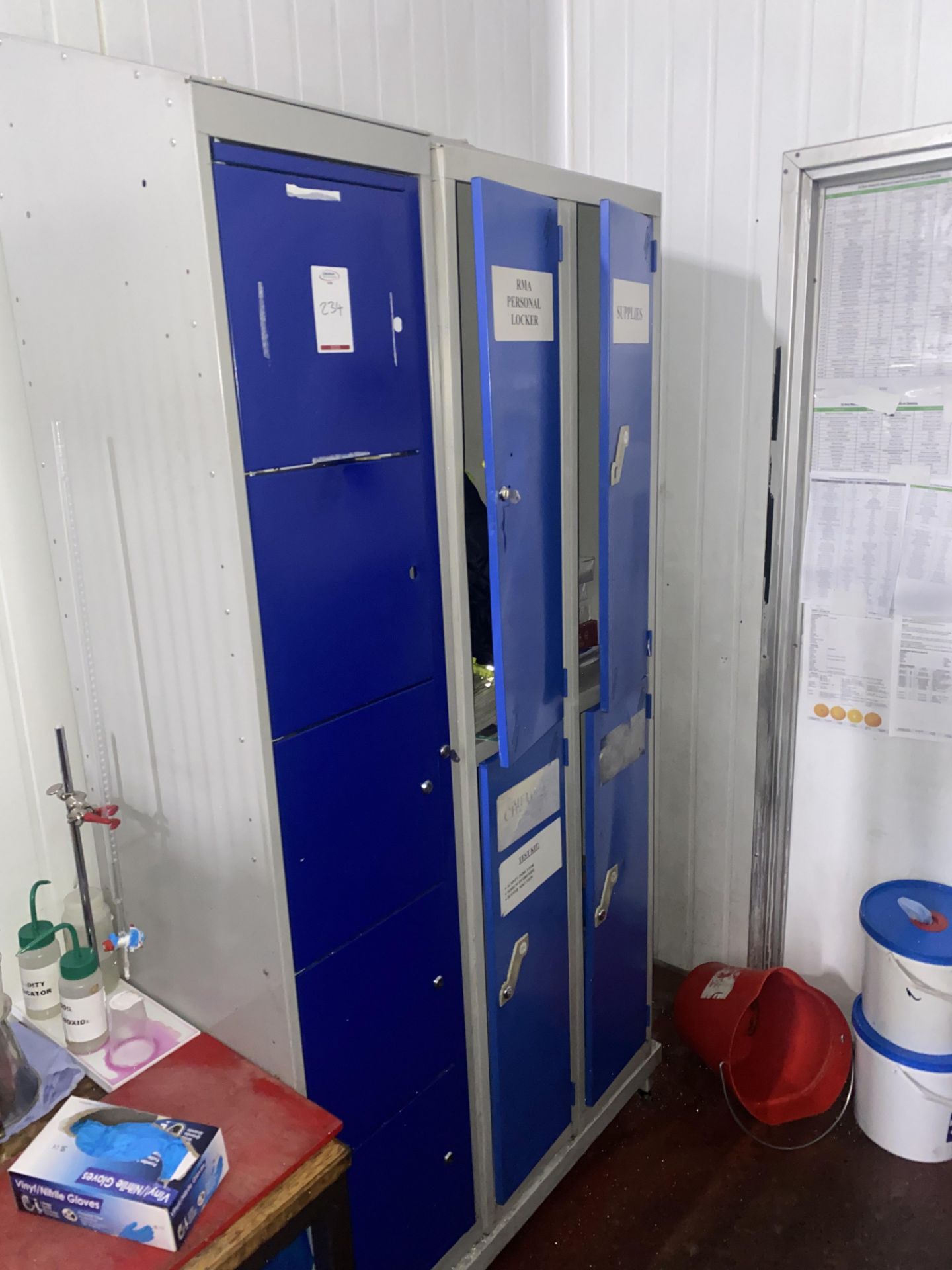 Stainless steel preparation bench , 3 locker units and 2 chairs (located in Factory 1)