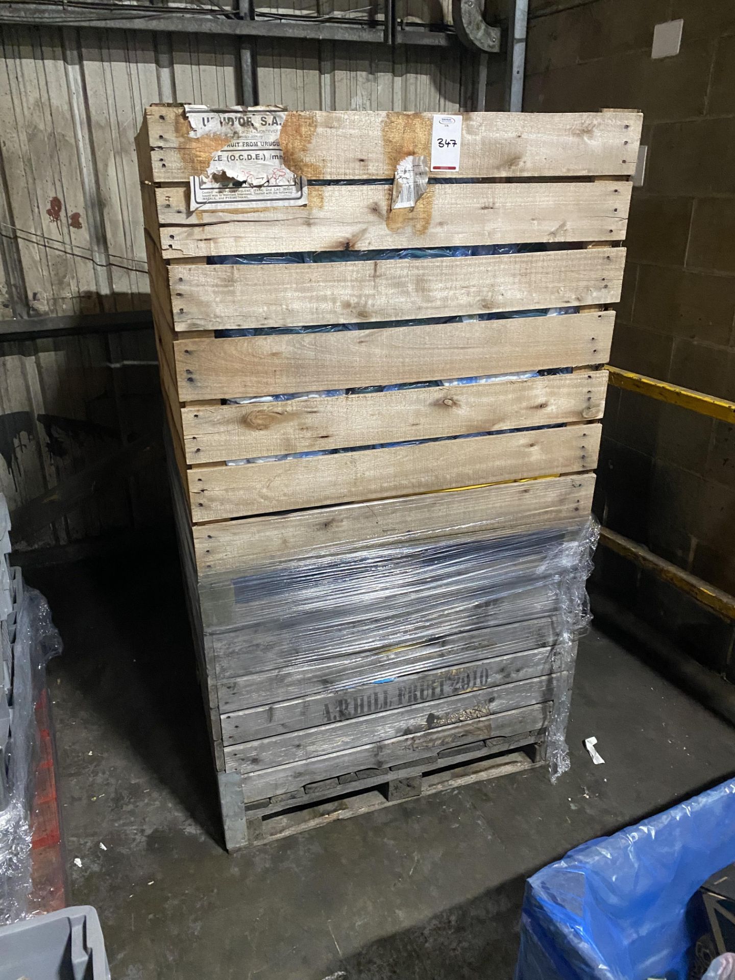 Contents of pallet to include a large quantity of Orchard house foods uniform and saftey wear (