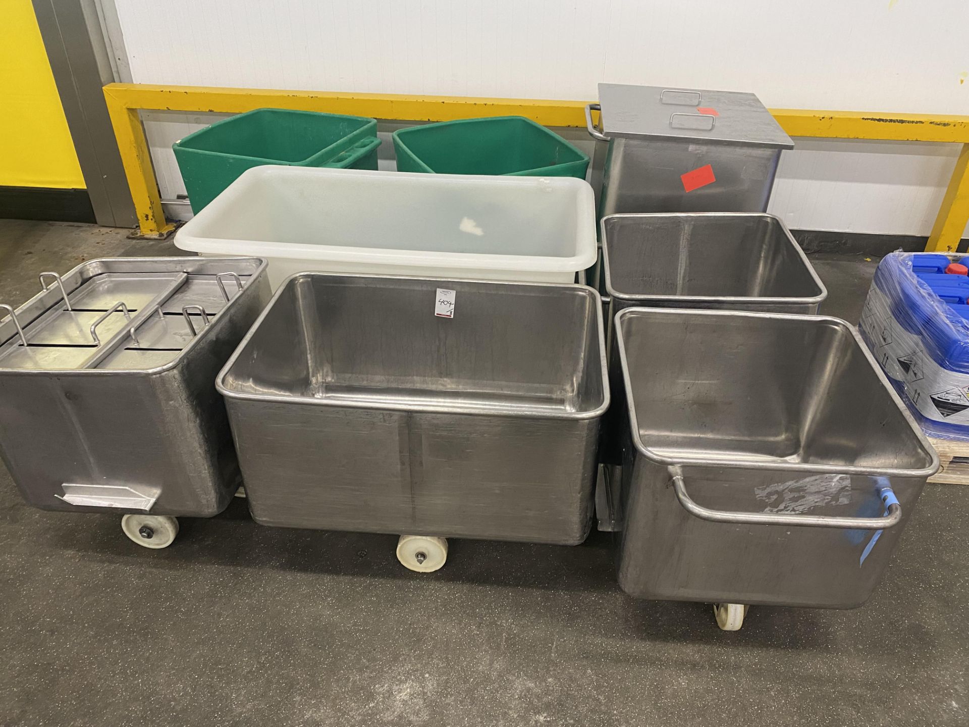 5 Various stainless steel mobile lifting bins complete with 2 mobile plastic lifting bins and a