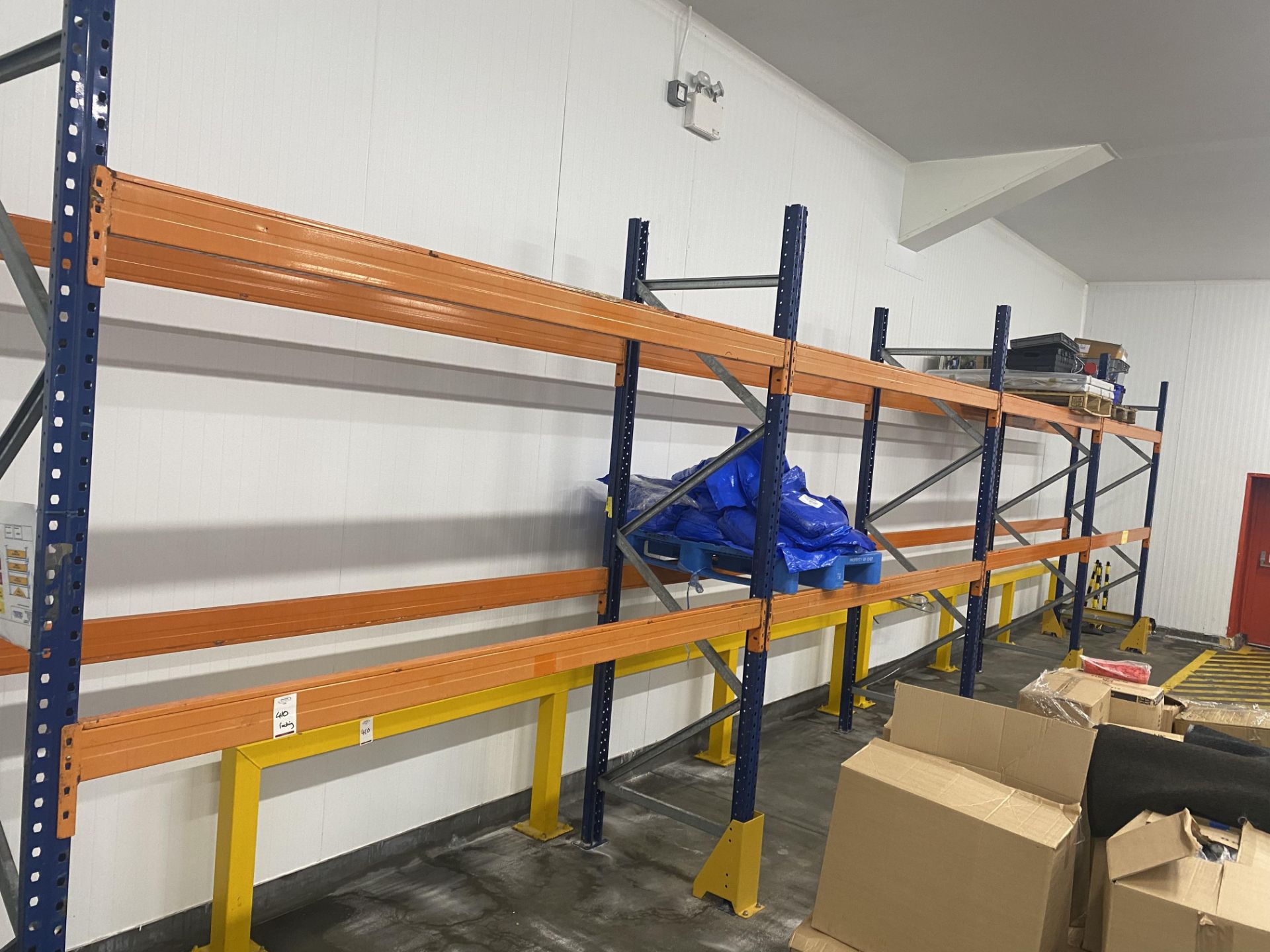 4 Bays of heavy duty racking comprising of 5 3m uprights and 16 2.7m cross beams , complete with 2