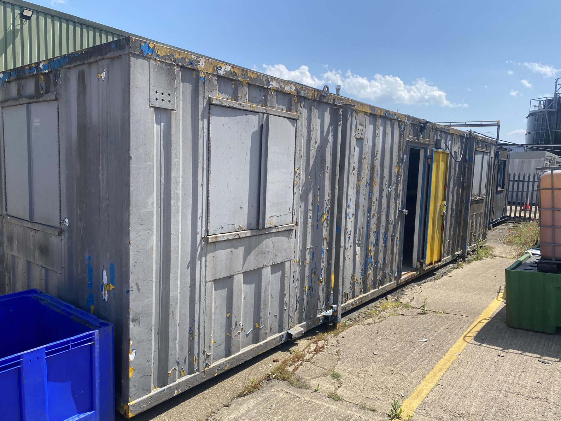 Jack leg shipping container and contents of 16 personal lockers , 32ft-10ft