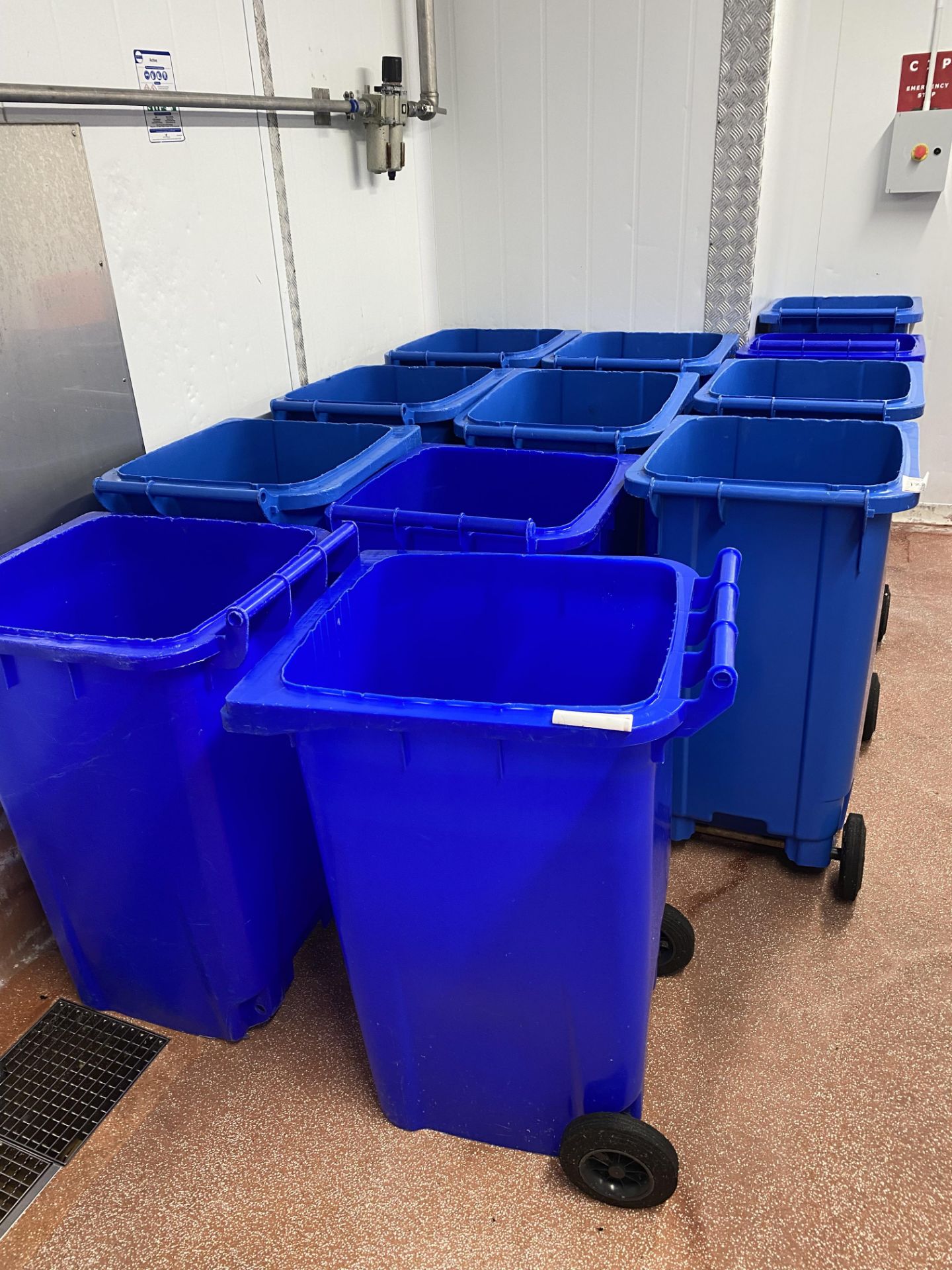 12 Blue 360 litre wheelie bins , no lids (2 have missing wheels)