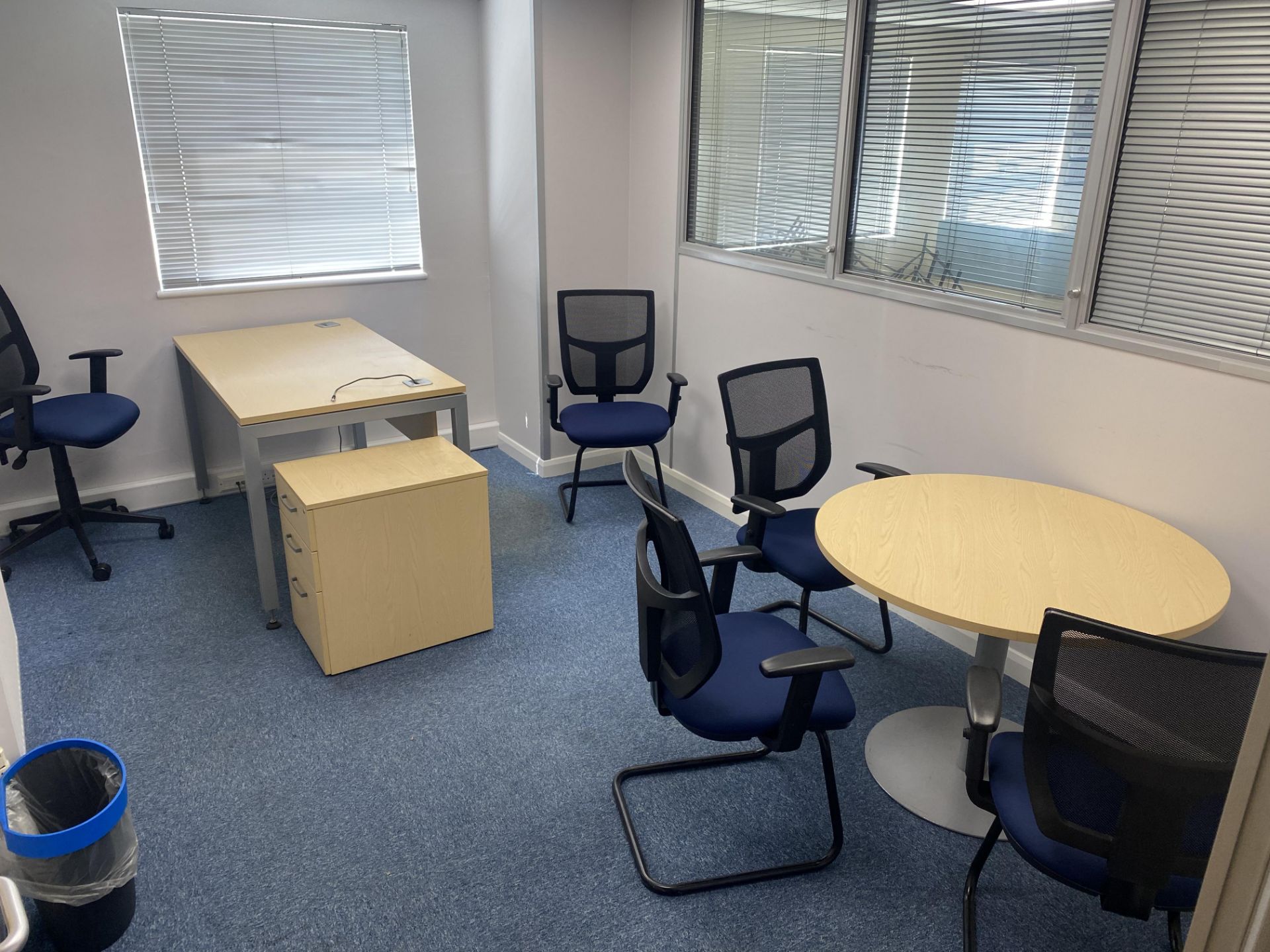 Contents of office to include desk , pedestal , office chair , 4 meeting room chairs and a round mee