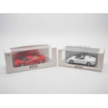 A pair of hand built limited edition resin 1:43 scale models by KESS, comprising of a 1991 Cizeta