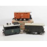 A group of LGB G gauge rolling stock comprising a Belgian steam tram loco and 2 wagons - one boxed -