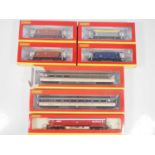 A group of HORNBY OO gauge rolling stock comprising various Seacow hopper wagons, a 100 ton tank