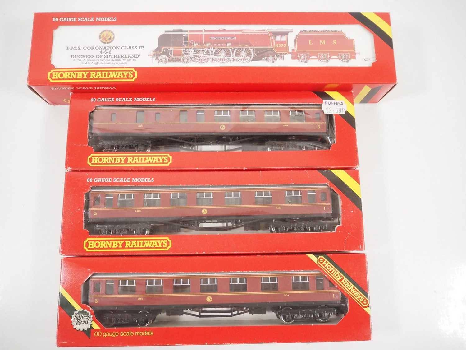 A group of HORNBY OO gauge LMS rolling stock comprising an R066 'Duchess of Sutherland' steam