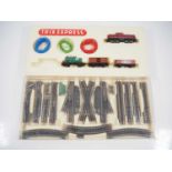 A TRIX EXPRESS HO Gauge 3-rail DC goods train set, missing one wagon and outer box but otherwise