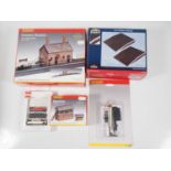 A small group of HORNBY OO gauge unbuilt plastic kits/signal together with a BACHMANN pair of