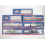 A group of BACHMANN OO gauge rolling stock and triple wagon packs including several limited editions