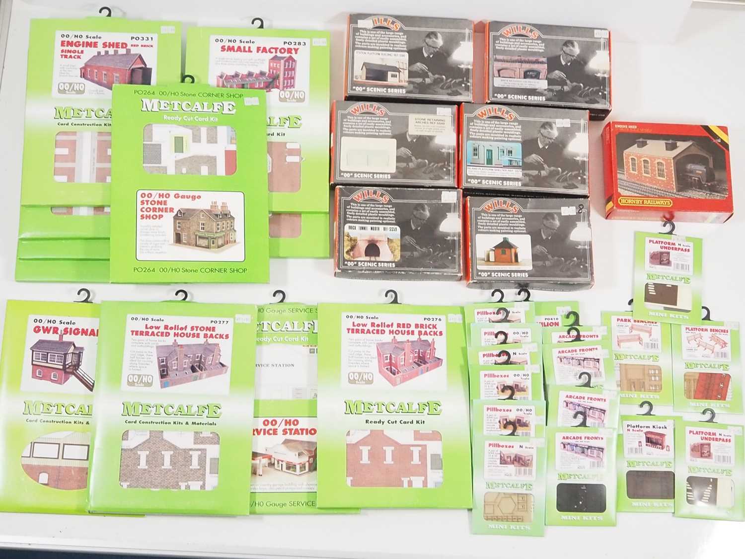 A large group of OO gauge kits by METCALFE, WILLS and HORNBY together with a few N gauge METCALFE