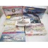 A quantity of unbuilt mostly military kits by AIRFIX, TAMIYA, HELLER and others in various