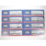 A group of BACHMANN OO gauge Mk1 and Mk2 passenger coaches and vans - mostly in blue/grey livery -