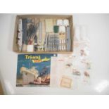 A large quantity of vintage TRI-ANG MINIC ships and accessories, all unboxed, together with a