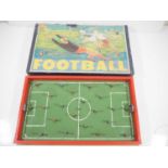 A vintage Polish table football game by KRAKPOL, circa early 1960s, with sprung players and ball