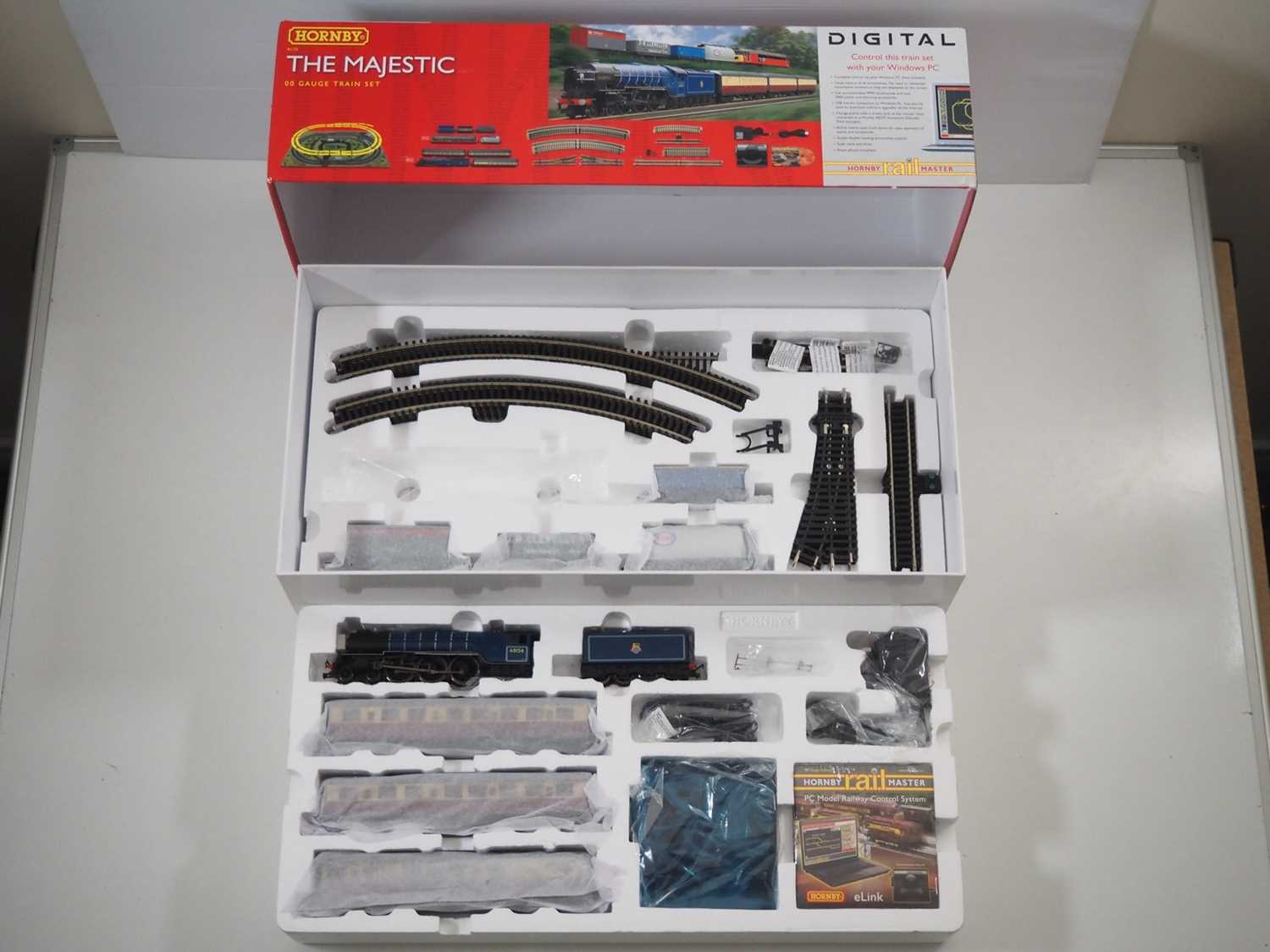 A HORNBY OO gauge R1172 'The Majestic' digital train set, missing diesel loco but otherwise complete