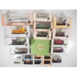 A group of OXFORD DIECAST 1:76 scale OO gauge diecast vans, buses, coaches and lorries, all appear