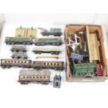 A group of playworn O gauge rolling stock, building and accessories by HORNBY and others - F unboxed