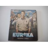 EUREKA - An official binder of modern trading cards by Rittenhouse (2011) comprising 63 cards of
