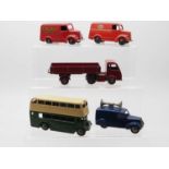 A group of DINKY Toys comprising a 31b Dunlop Trojan van, a 31a Esso Trojan van, a 290 Double Decker