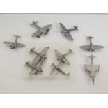 A group of pewter models of military aircraft to include Supermarine Spitfire and Hawker Hurricane -