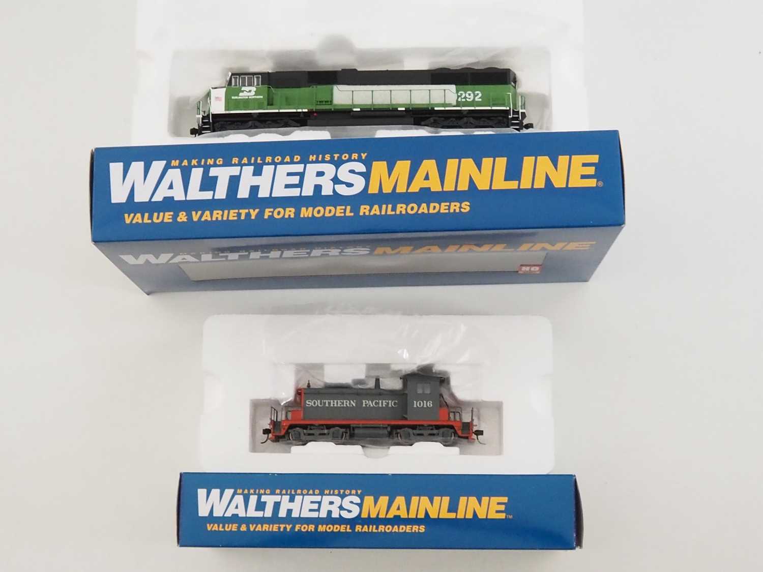 A pair of WALTHERS MAINLINE HO gauge diesel locomotives comprising a SW-1 in Southern Pacific livery