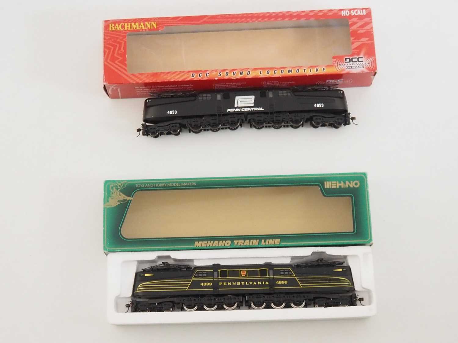 A pair of HO gauge American outline GG-1 electric locomotives by MEHANO and BACHMANN (DCC fitted -