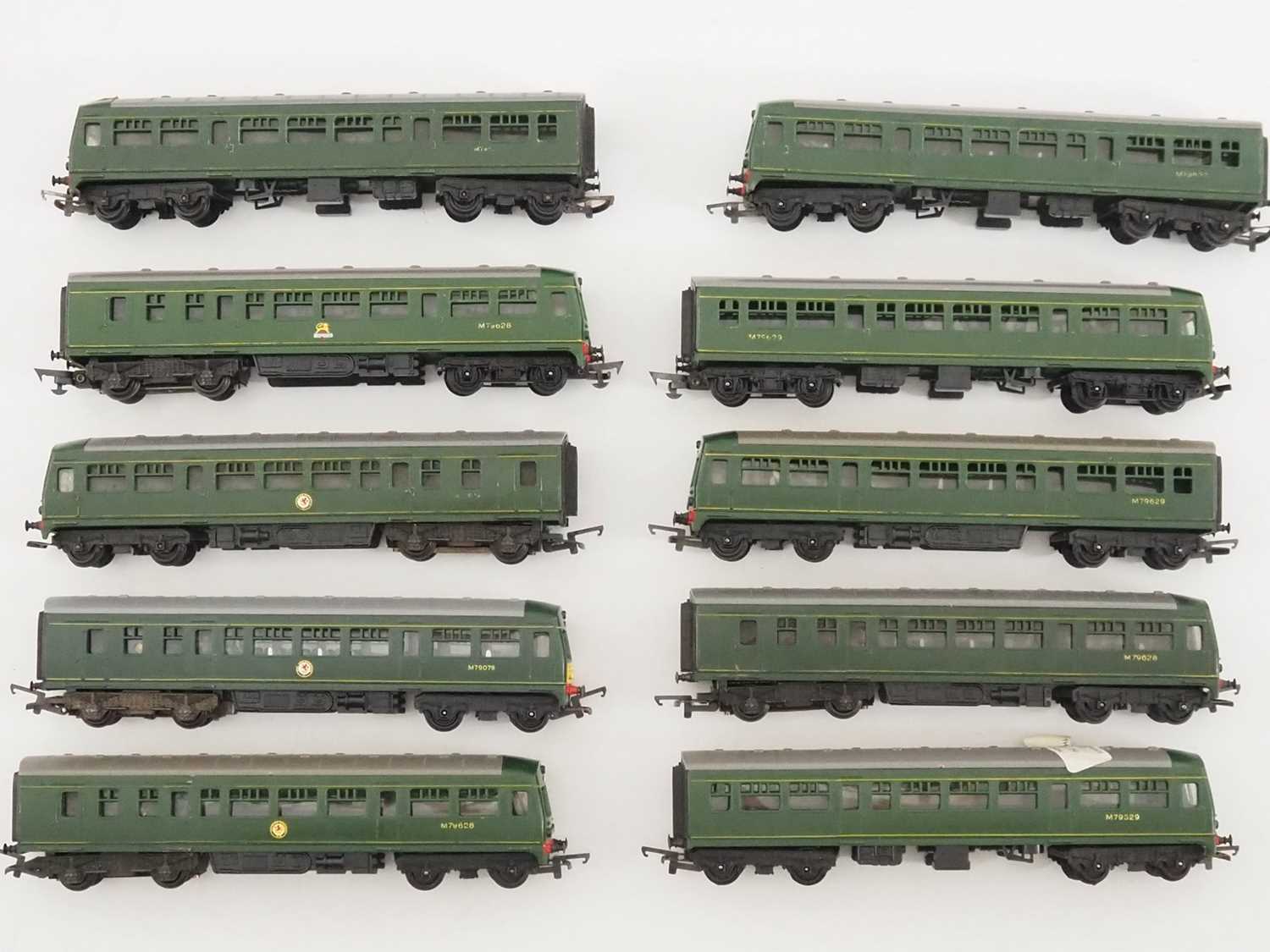 A group of TRI-ANG OO gauge diesel railcars all in BR green livery - F/G (unboxed) (10)