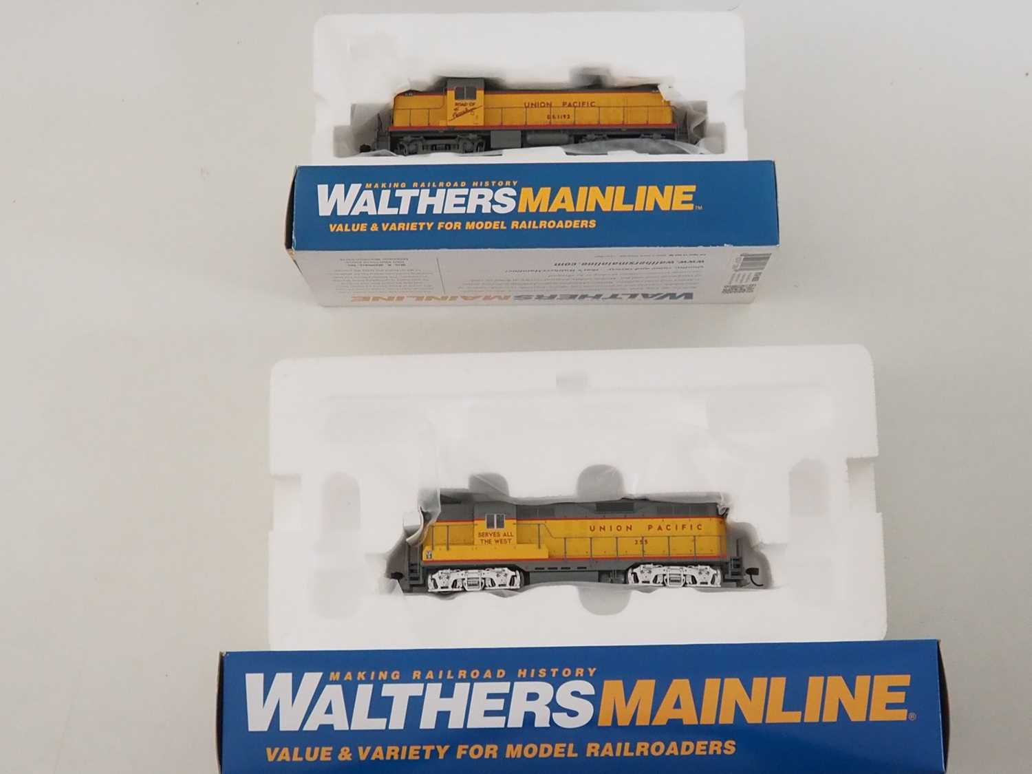 A pair of WALTHERS MAINLINE HO gauge diesel locomotives both in Union Pacific livery - VG in VG