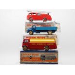 A group of DINKY Toys comprising a 932 Comet Wagon with hinged tail board - version with cream hubs,