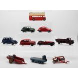 A group of DINKY Toys to include: a 181 VW Beetle and a 152 Austin Devon - F playworn examples