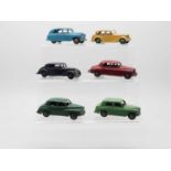 A group of DINKY cars comprising a No 156 Rover 75, a 40g Morris Oxford, a 153 Standard Vanguard,
