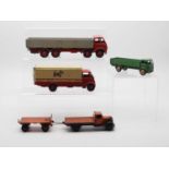 A group of DINKY trucks, comprising of a 501 Foden Diesel 8 Wheel Wagon (1st Type), a Dinky 514