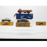A group of DINKY Toys plus an empty box, comprising a 164 Vauxhall Cresta, two tone grey and