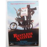 RESTLESS NATIVES (1985) - A group of memorabilia items comprising a one sheet film poster, set of