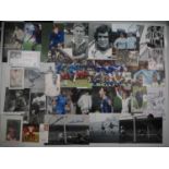 A selection of football related autographs to include Paul Gascoigne, Neville Southall, Bobby