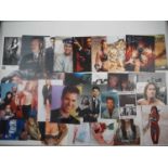 A group of mixed television and film related autographs to include Kim Cattrall, Brian Detson,