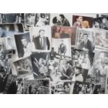 A large quantity of mixed black/white film and publicity stills covering a wide range of films and