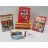 A mixed group of TINTIN / HERGE related books comprising: The Adventures of TINTIN At Sea; The