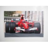 MICHAEL SCHUMACHER signed 10" x 8" colour photograph of a Ferrari Formula 1 car