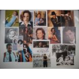 A group of television and film related autographs to include Robert England, John Travolta, Kurt